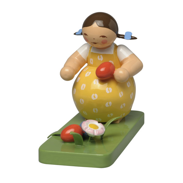Mädchen am Osternest