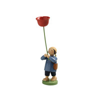 Junge mit Mohnblume