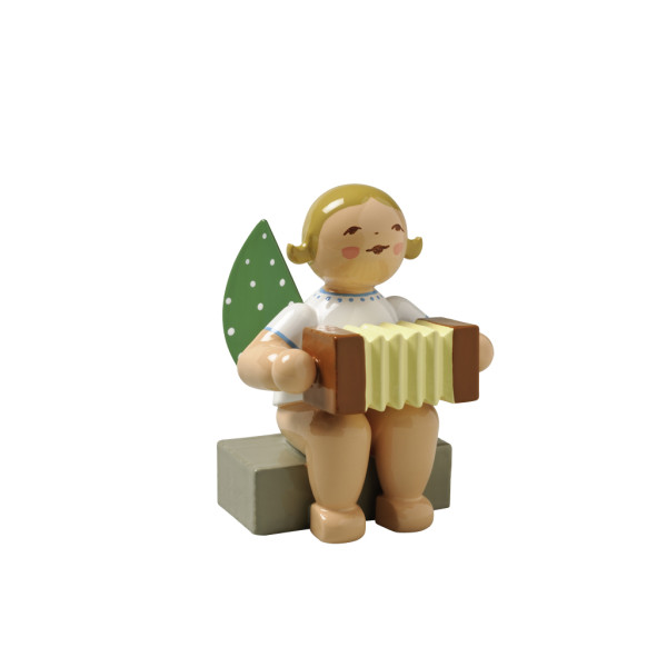 Engel mit Harmonika, sitzend
