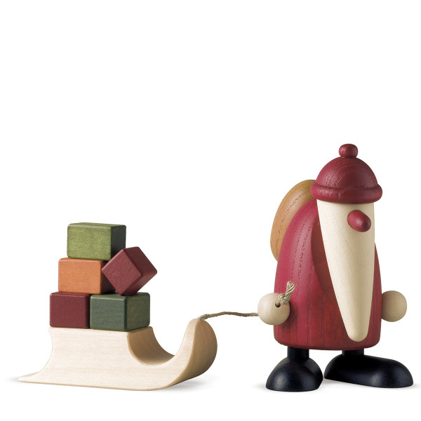 Weihnachtsmann mit Geschenkeschlitten
