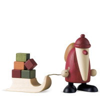 Weihnachtsmann mit Geschenkeschlitten