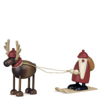 Rentier Rudolf mit Weihnachtsmann auf Ski