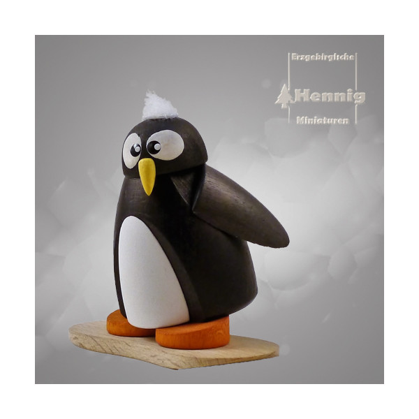 Pinguin auf Snowboard