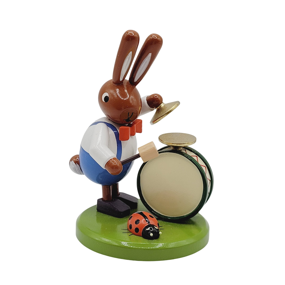 Hase mit Trommel und Käfer